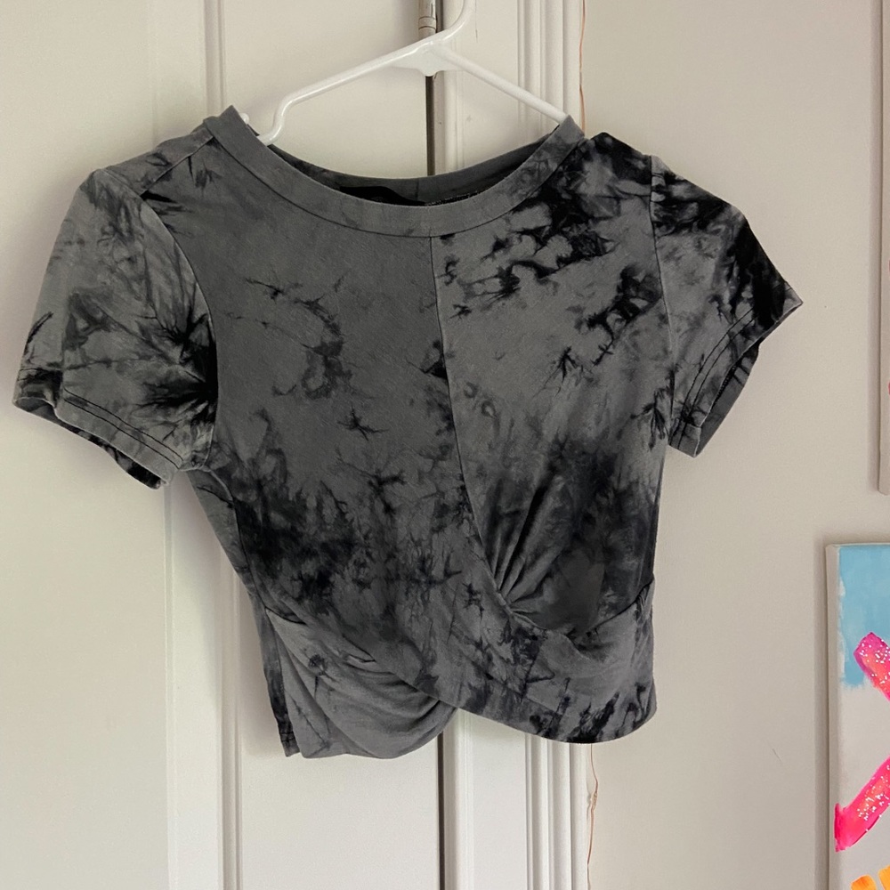 Black and grey tie dye crop top with cross material at the bottom